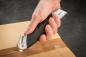 Preview: Dahle cutter heavy duty safety 10892-16226 schwarz/grau, m. trapezklinge - Dahle-10892-16226-4009729074701-05.jpg